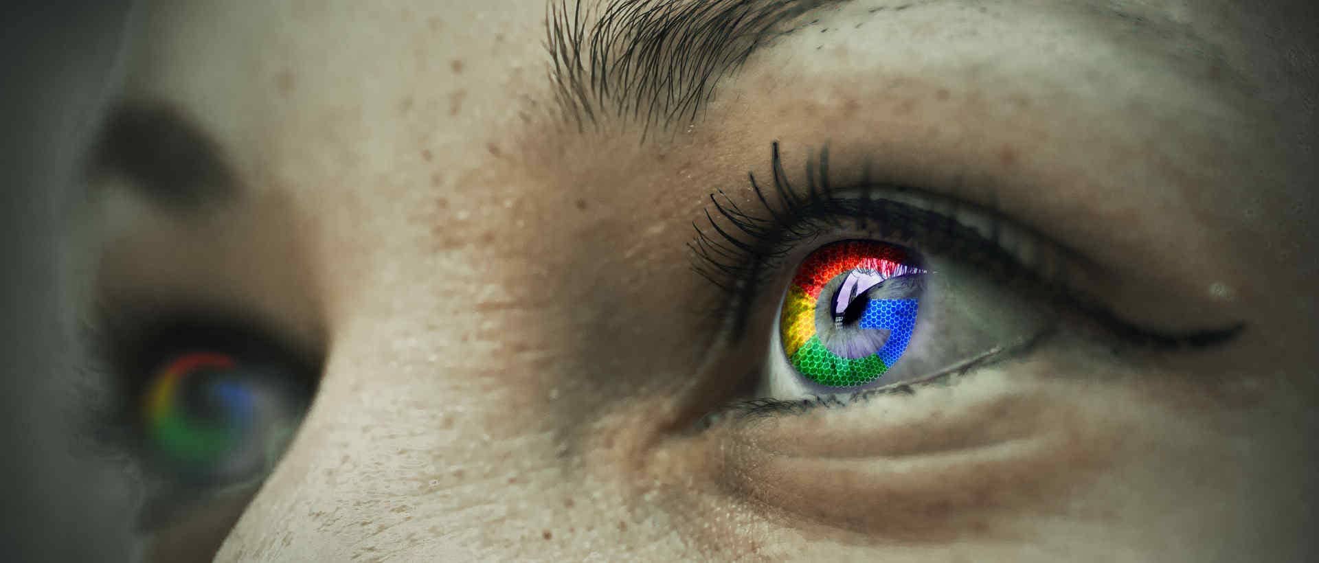 A girl's eyes are reflecting a Google logo.