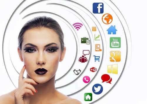 Thinking woman surrounded by social media app icons